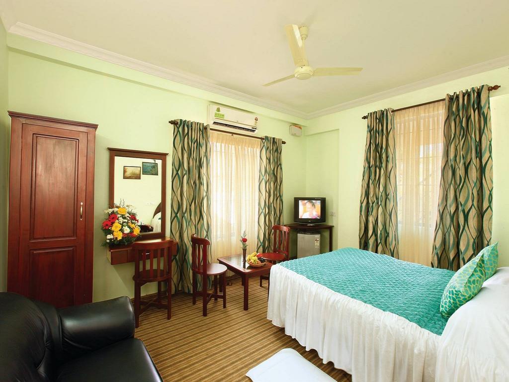 Sm Regency Kochi Værelse billede